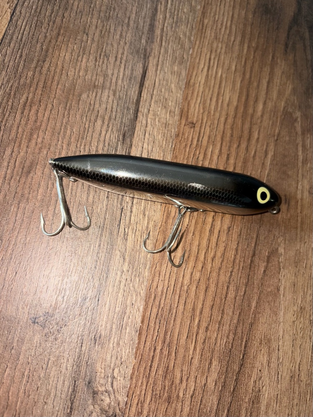 Black Fishing Topwater Plug Lure with Yellow Eye